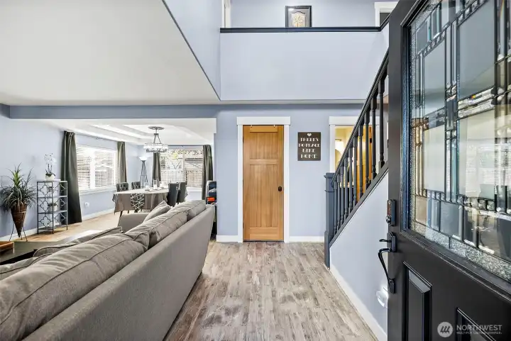 Keypad access on front door. Entry way opens into front living room, storage closet and half bath in front of stairwell.