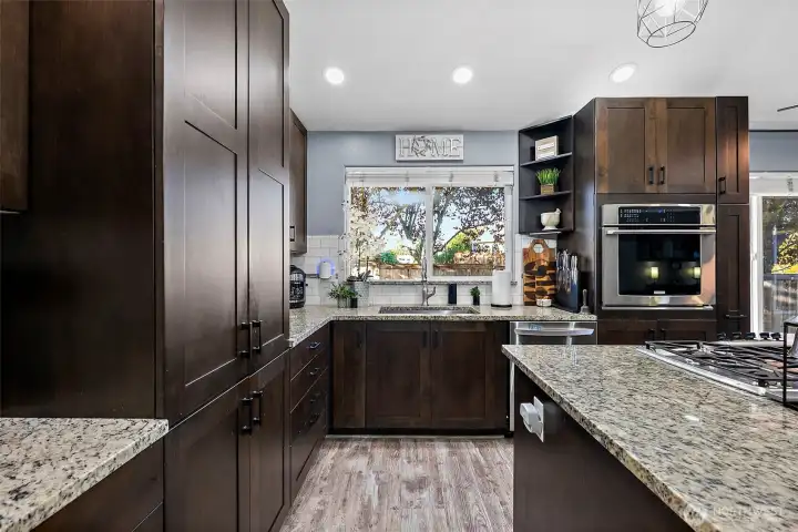 Abundant storage space in this well lit kitchen