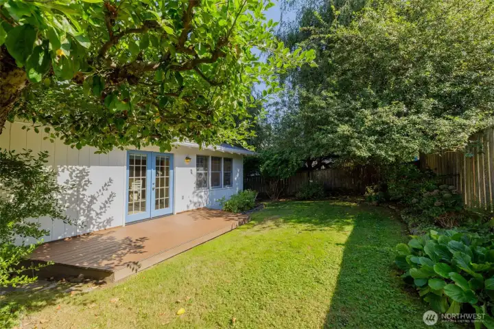 This sweet and intimate part of the yard feels like an extension of the home.