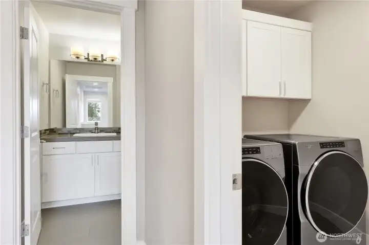 Bathroom with separate upstairs laundry!