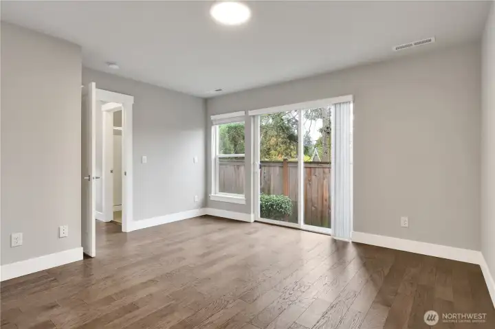 Downstairs bedroom with sliding glass door!