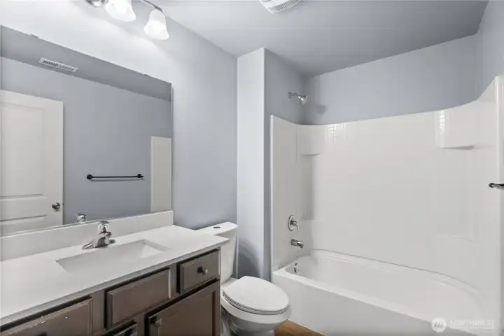 Full bath just off the mail level bedroom!