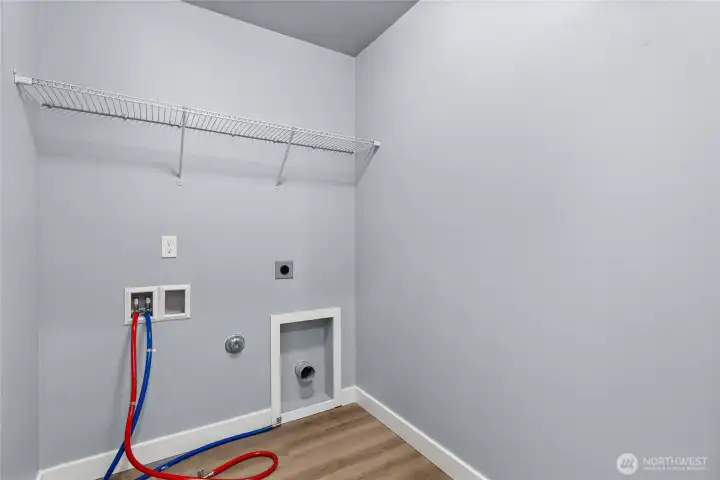 Upstairs laundry room, so convenient