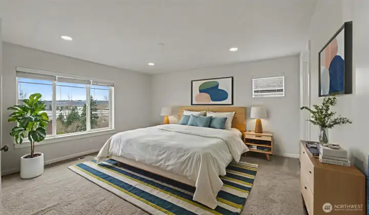 Primary bedroom with view.