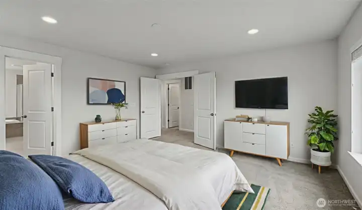 Primary bedroom with french doors.
