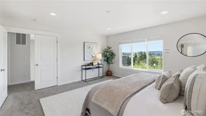 Primary bedroom with view.