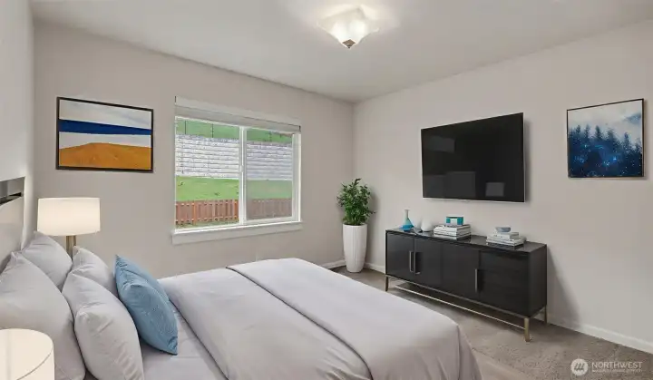 Extra large bedroom w/ back yard view.