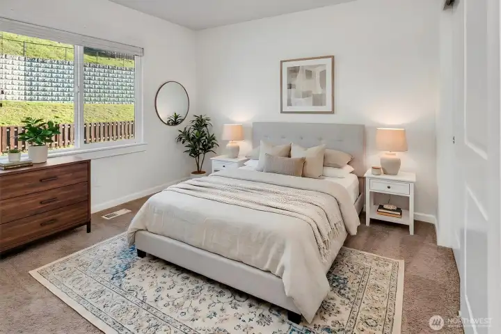 Extra large bedroom w/ back yard view.