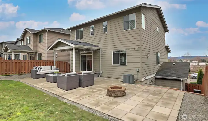 Huge well-manicured backyard.