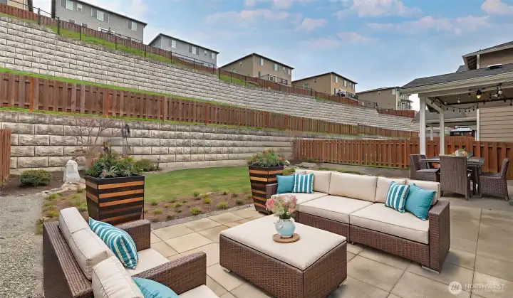 Huge well-manicured backyard.