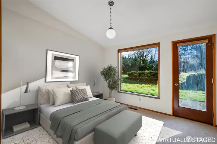 Bedroom 2 (windows and a door out to a common patio)