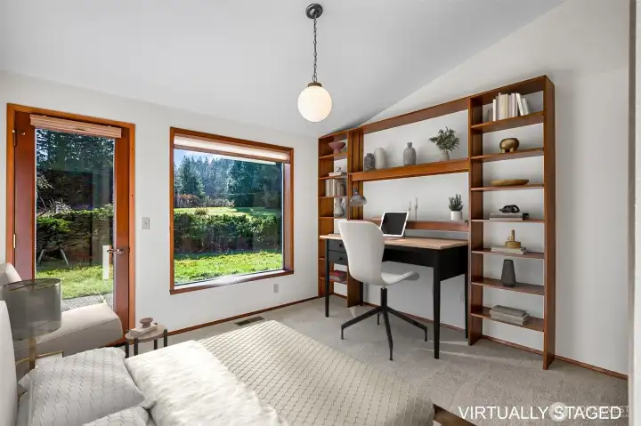 Bedroom 3 (windows and a door out to a common patio)