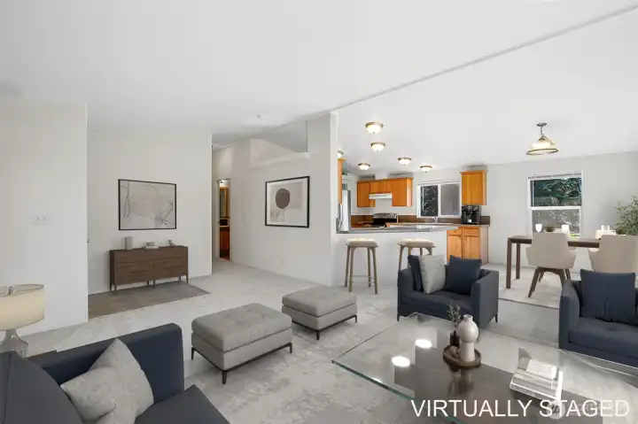 Living looking to king and open kitchen.