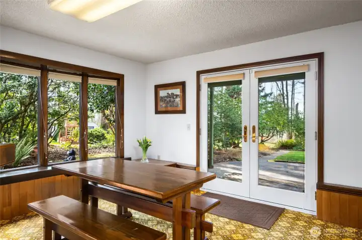 Lower level French doors lead to patio and backyard