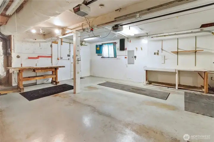 Shelving, worktops, and ample storage space in the garage.