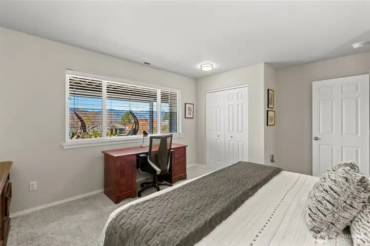 Lower-level guest bedroom #1 with Lake Chelan and mountain views in this Lake Chelan view home.