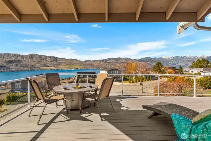 This spacious view deck is ideal for lounging or entertaining after a day at the Lake Chelan Hills parks, waterfront, and community pools.