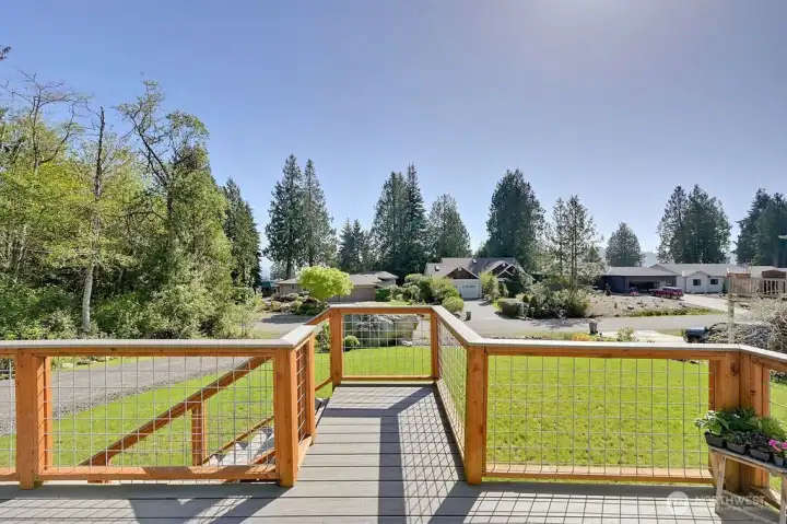Front deck has plenty of room for all to enjoy, morning sunrises, all the natural settings, mountain views and filtered water view.  Trex decking and easy to care for fencing.