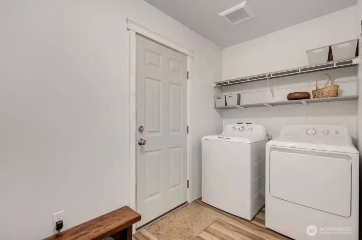 Nice size laundry room with garage entrance.