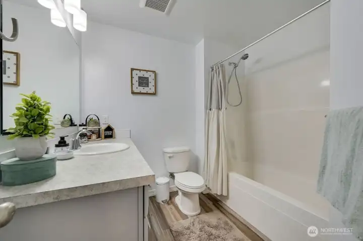 Full guest bath with clean finish and functional layout.