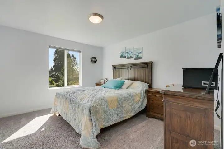 Bedroom with filtered views of water.  Deer often wander by which is an added bonus.