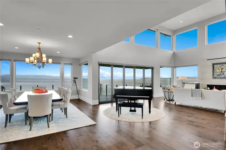 Great room with walls of windows and vaulted ceilings Great room with walls of windows and vaulted ceilings
