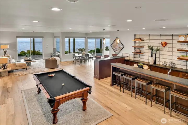 Entertainment zone on lower level complete with bar and beverage center Entertainment zone on lower level complete with bar and beverage center