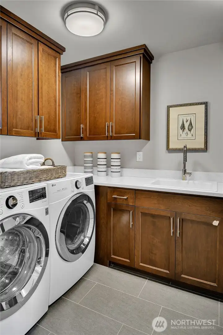 1 of 2 laundry rooms 1 of 2 laundry rooms