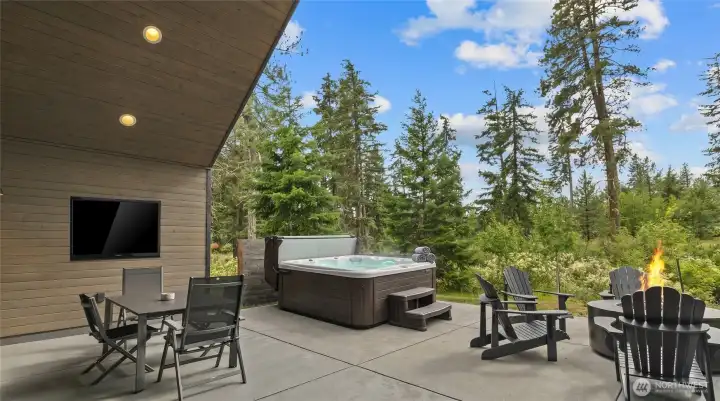 Patio with hot tub, firepit, barbeque, tv, dining area Patio with hot tub, firepit, barbeque, tv, dining area