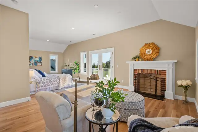 Primary Sitting area with Doors Leading to Balcony