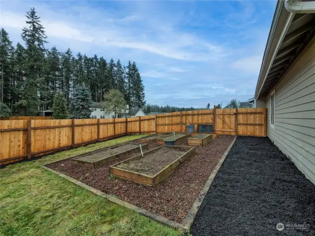 Multiple Garden Beds with sprinklers