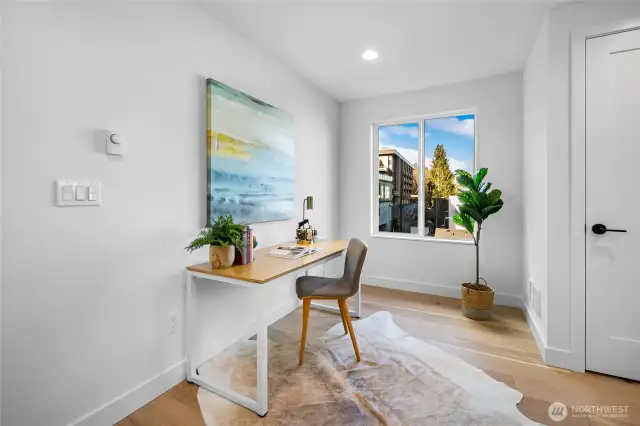 Workday wrapped? Close the laptop and soak up a sunset view from the desk—then head one flight up to the rooftop deck. Photos are of model home 2009B.