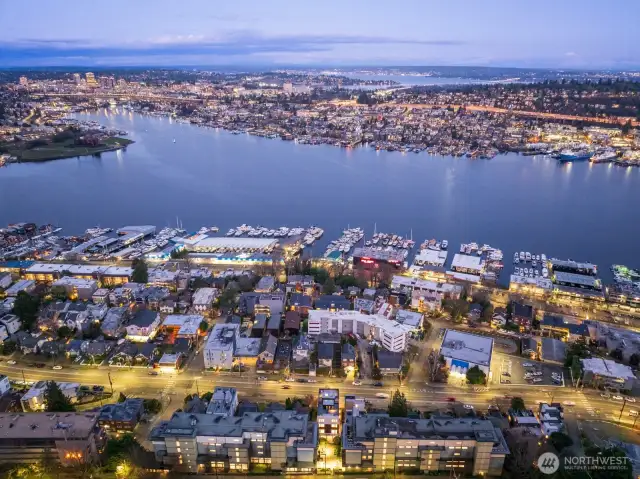 A broader lake panorama shows marinas, houseboats, and Tech Row—offering an at-a-glance reminder of why you chose Dexter. Photos are of model home 2009B.