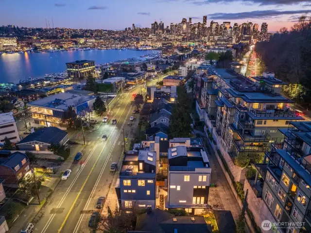Looking south, your rooftop lounge captures both city lights and lake reflections—an ideal backdrop for evening cocktails. Photos are of model home 2009B.