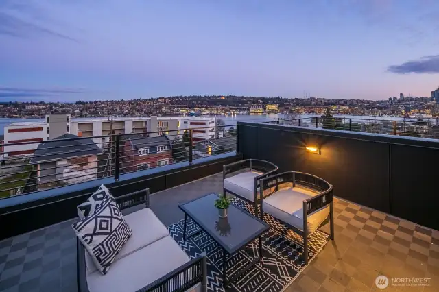 Rotate slightly west and the same deck becomes an intimate perch for star-gazing or watching sailboats drift home. Photos are of model home 2009B.