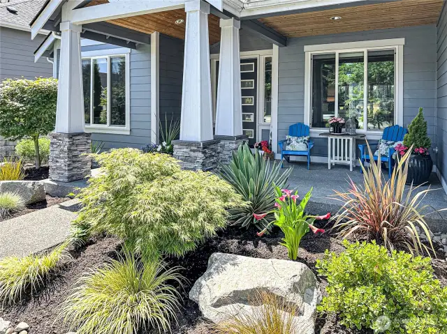 Charming covered front porch greets visitors and is the perfect place to relax.