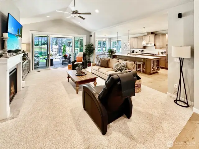 Stunning vaulted great room and kitchen off of entry and dining.  Large slider offers access to covered patio and golf course views.