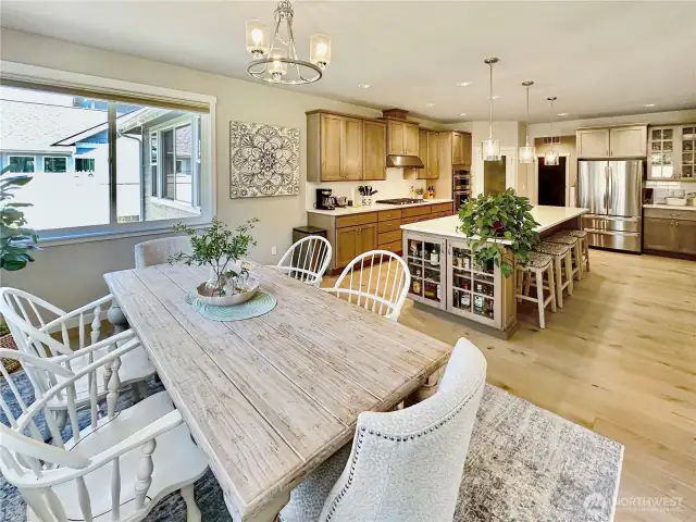 View from large, kitchen eating area towards kitchen.
