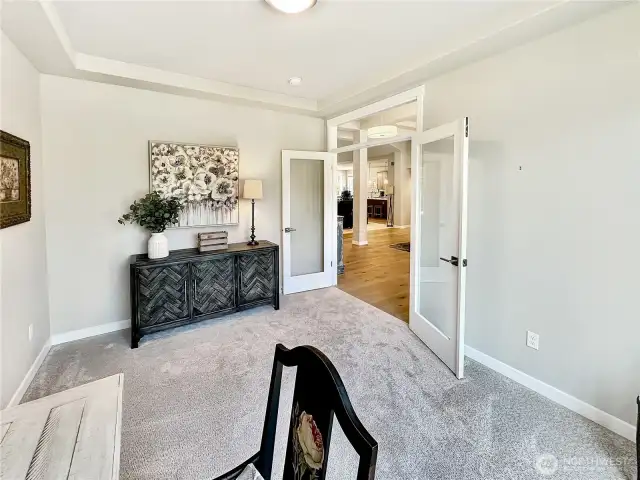 View from inside den looking towards entry.