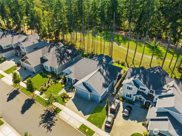 Another view shows fairway and serene rear views.