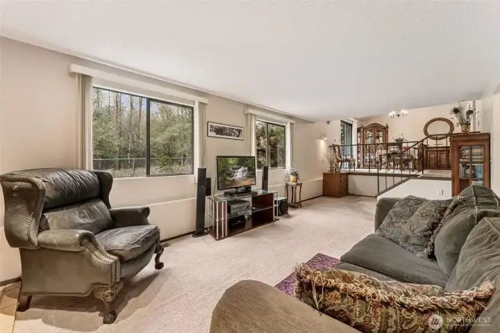 Family room looking up to the dining area.