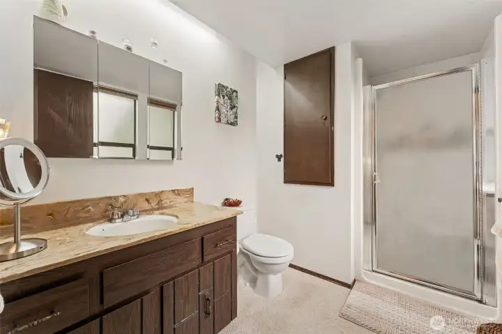 Primary bathroom. Plenty of space to redesign and make it your own!