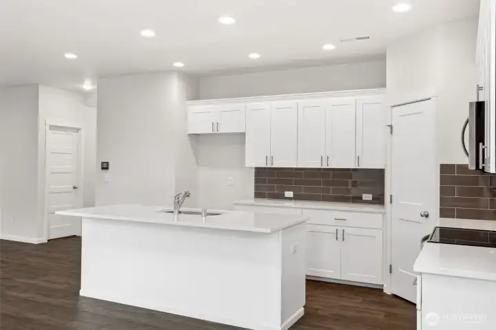 **Photos are of the same floorplan in another community. Some colors and features will cary**