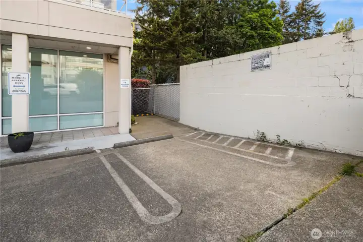 Second assigned parking space in front of secured entrance.