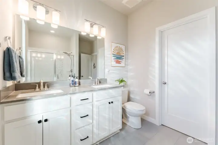 Large walk-in closet conveniently located behind this door in en-suite bathroom.