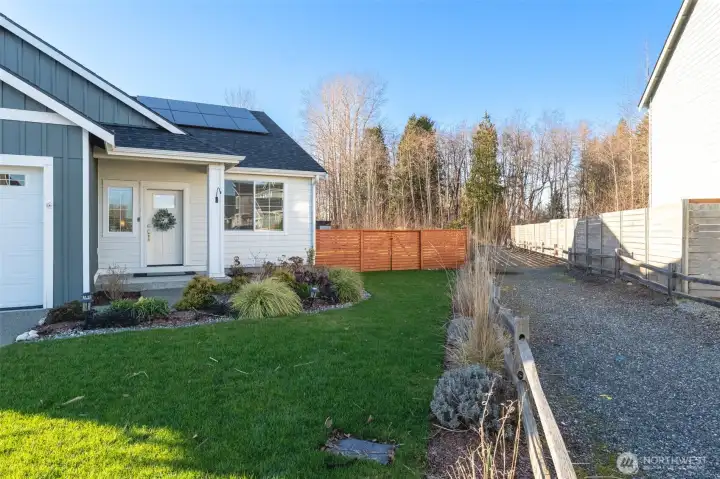 The community trail borders the property and gives an added feeling of privacy with no neighbor immediately next door.