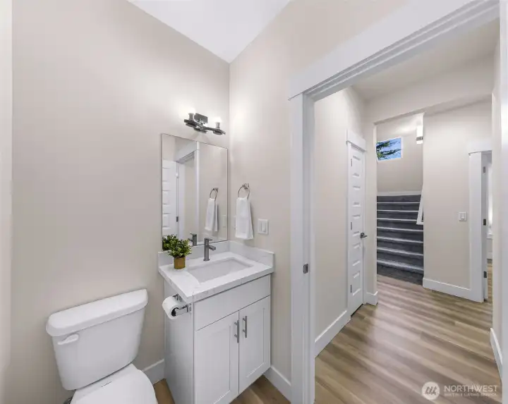 Half bathroom for guests off the main living space.
