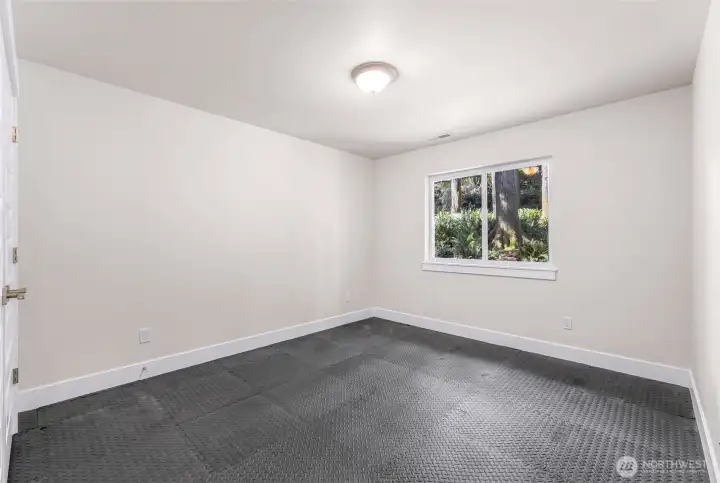 Third bedroom has been converted to a workout room.
