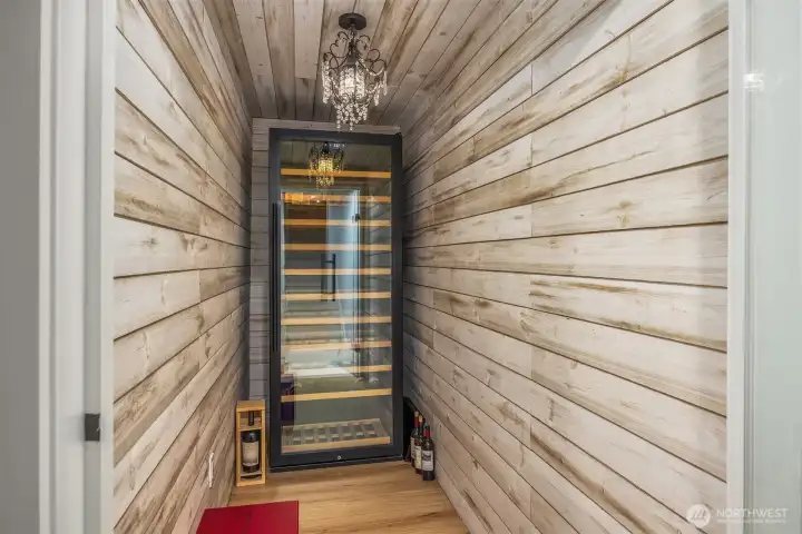 The fully remodeled lower level shines with this beautiful wine cellar. The room is sealed and has temperature controlled capabilities with thermostat.