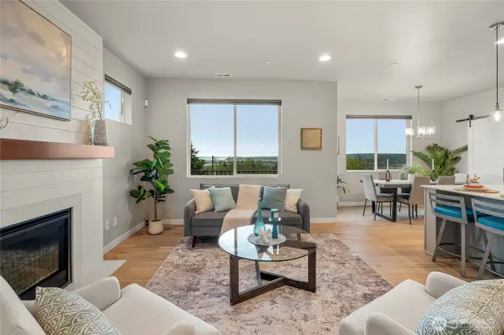 A gas fireplace, with fan and quartz hearth, makes evenings cozy.